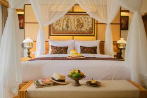 Govala Ubud Villas & SPA में एक कमरे में एक या कई बेड