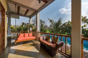 Балкон или тераса в SaffronStays Happy Fields, Pune - luxury farmstay with farm to table food