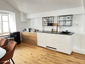 Una cocina o kitchenette en Penthouse MaxFux direkt in der Fußgängerzone 130m2