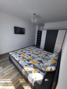 Vuode tai vuoteita majoituspaikassa Apartament Coco