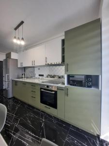 Majoituspaikan Apartament Coco keittiö tai keittotila