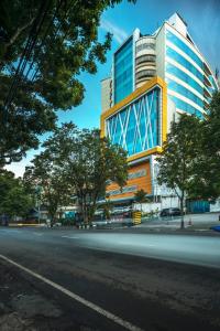 a building on the side of a city street at THE 1O1 Malang OJ in Malang