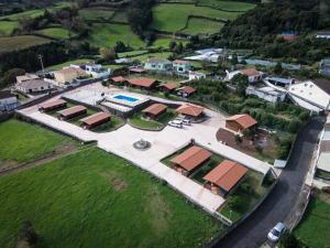 The swimming pool at or close to Vila Emigrante