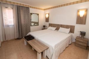 Tempat tidur dalam kamar di Casa Isabel, the perfect home for your holidays in Corralejo