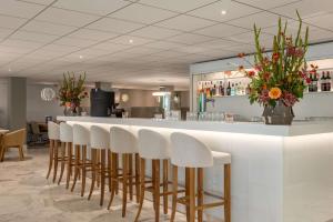 Khu vực lounge/bar tại NH Amsterdam Schiphol Airport