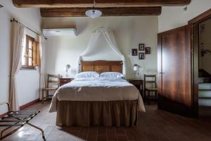 Llit o llits en una habitació de B&B Hotel La Piana