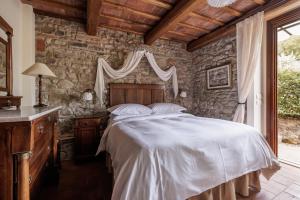 Llit o llits en una habitació de B&B Hotel La Piana