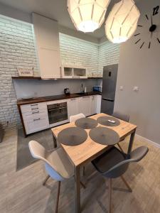 Una cocina o kitchenette en Apartament Byka