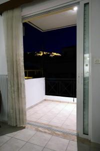 Балкон или терраса в Angelina’s Boutique Suite in Nafplio City