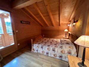 Cama ou camas em um quarto em L'Aulp De Suz 1 - Demi chalet