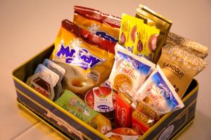 a container filled with different types of food at Mama House Roma in Rome