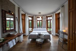 A bed or beds in a room at POSADA SEMILLA