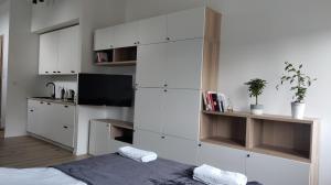 Krevet ili kreveti u jedinici u objektu Apartament 4 Piętro