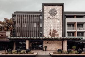 a building with a clock on the side of it at The Executive Inn, Newcastle in Newcastle