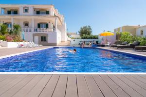 Swimmingpoolen hos eller tæt på Vida Boa Lodge