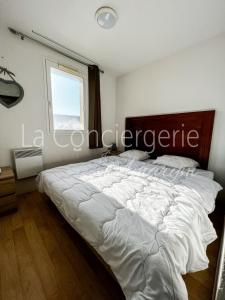 Cama ou camas em um quarto em SVC 13 - Bel appartement proche mer avec balcon