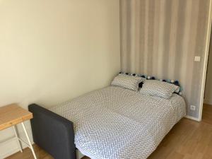 Voodi või voodid majutusasutuse Appartement T3 centre ville Mabilais au calme. toas