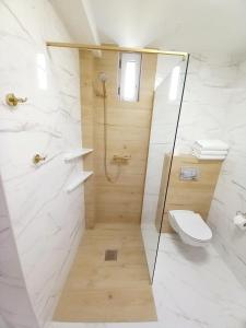 Ванна кімната в Rewianka Apartamenty przy samej plaży