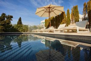 The swimming pool at or close to Convent de la Missio - Grand Luxury Boutique hotel, Adults Only