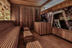 Uma área de estar em Alpenhotel Fischer 4 Sterne - Adults Only