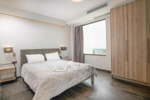 Легло или легла в стая в Serenity Suites Sea View Houses - Happy Rentals