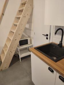 Eldhús eða eldhúskrókur á Apartman Dux 2