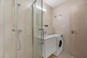 A bathroom at Metropolitan Star Apart Hotel