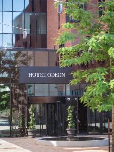 a hotel obborn sign in front of a building at Hotel Odeon in Odense