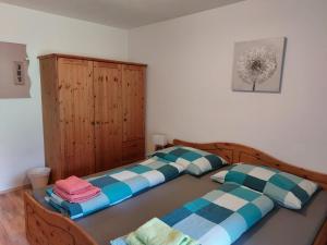 Кровать или кровати в номере Apartment Lochner Piesendorf-Walchen