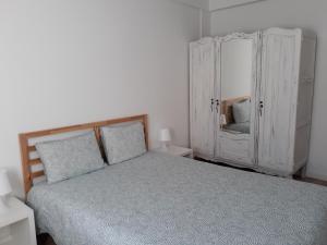 Cama ou camas em um quarto em A Mansão do Mé-Mé