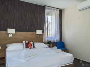 Krevet ili kreveti u jedinici u objektu Easy Suites Hévíz