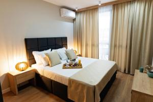 Burgas Beach Resort 2 Apartments房間的床