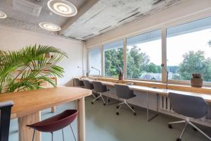 Majoituspaikan Tech Spa Coliving&Coworking Spaces työ- tai konferenssitilat