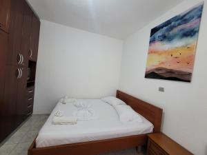 Giường trong phòng chung tại Spahiu Guesthouse