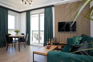 โทรทัศน์และ/หรือระบบความบันเทิงของ Luxus Apartament Tulipan