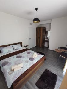 Voodi või voodid majutusasutuse GOPO Guesthouse Elshani toas