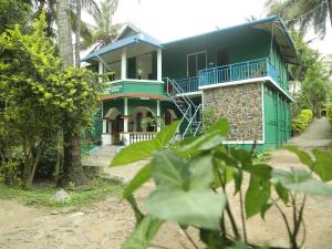 En hage utenfor JUNGLE PARADISE FARM & GUEST HOUSE