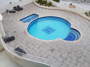 Kolam renang di atau di dekat 303 El Rodadero, Apartamento Familiar , piscina , parqueadero