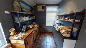 Una cocina o kitchenette en DuinHotel Texel