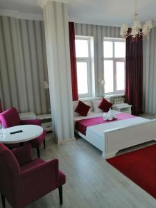 Gulta vai gultas numurā naktsmītnē Apart Hotel Триумф Астаны 22 этаж, Секция 2