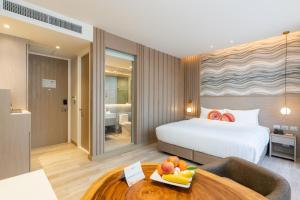 Maven Stylish Hotel Hua Hin 객실 침대