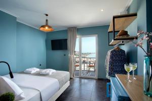 Cama ou camas em um quarto em CONTE CRISTO Suites