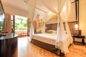 Krevet ili kreveti u jedinici u objektu Bintang Bali Resort