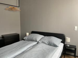 Postel nebo postele na pokoji v ubytování Alpha Fremdenzimmer