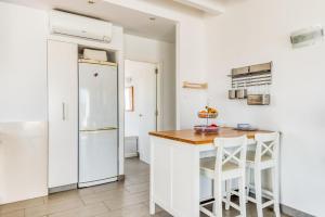 Apartamento en Es Grau con vistas廚房或簡易廚房