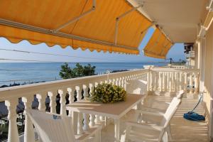 Uma varanda ou terraço em Olympic Beach Rooms