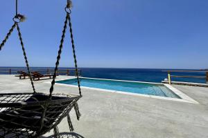 Poolen vid eller i närheten av Ocean Bliss Villa, By Hellocrete