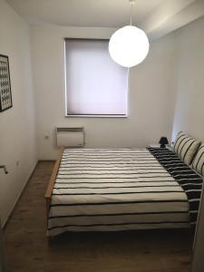 Posteľ alebo postele v izbe v ubytovaní Apartment Adi