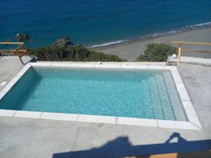 Poolen vid eller i närheten av Ocean Bliss Villa, By Hellocrete