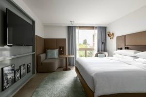 Giường trong phòng chung tại Amsterdam Marriott Hotel